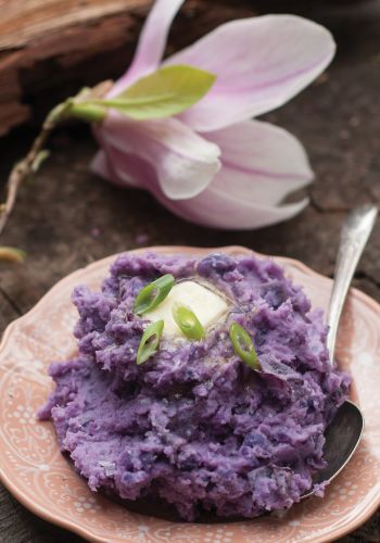 A Plate With Mashed Purple Potatoes