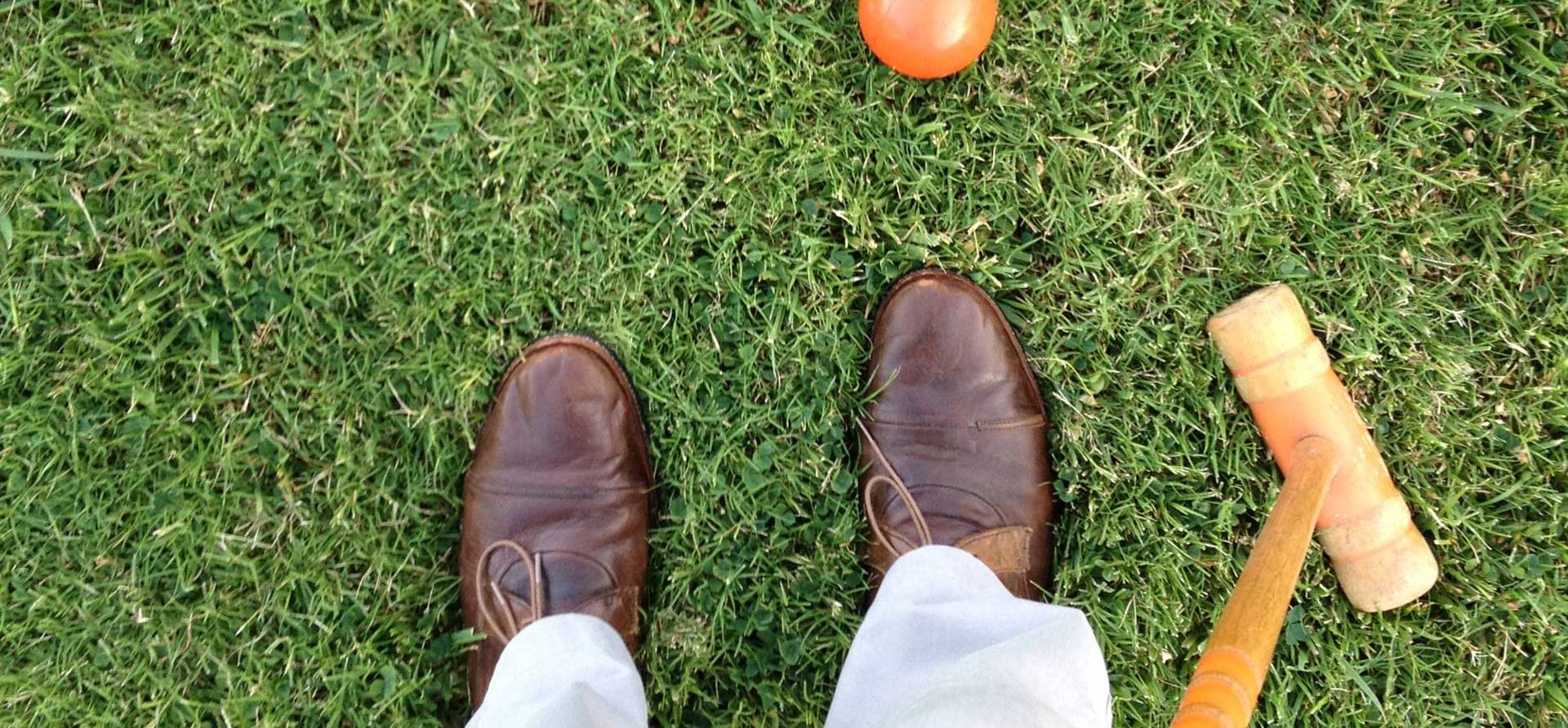 Dress Shoes, A Croquet Mallet and Ball